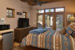 There is a separate Casita in the center of the home with a queen bed, kitchenette and private bathroom